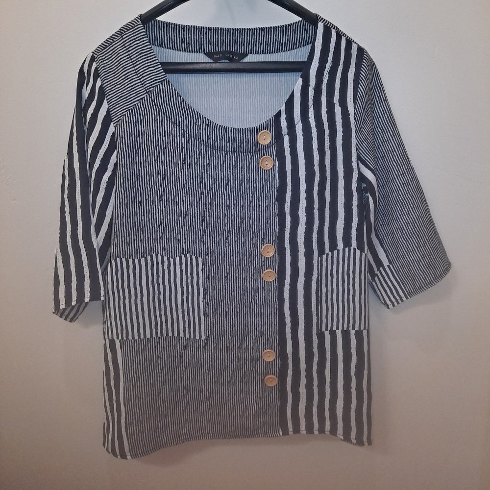 Blouse with black and white stripes